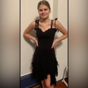 Black Mini Dress- (Adult Med) Laces up the back. With layered chiffon ruffles